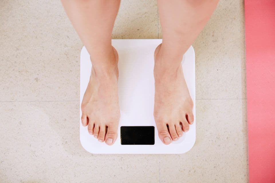 Feet on a weighing scale